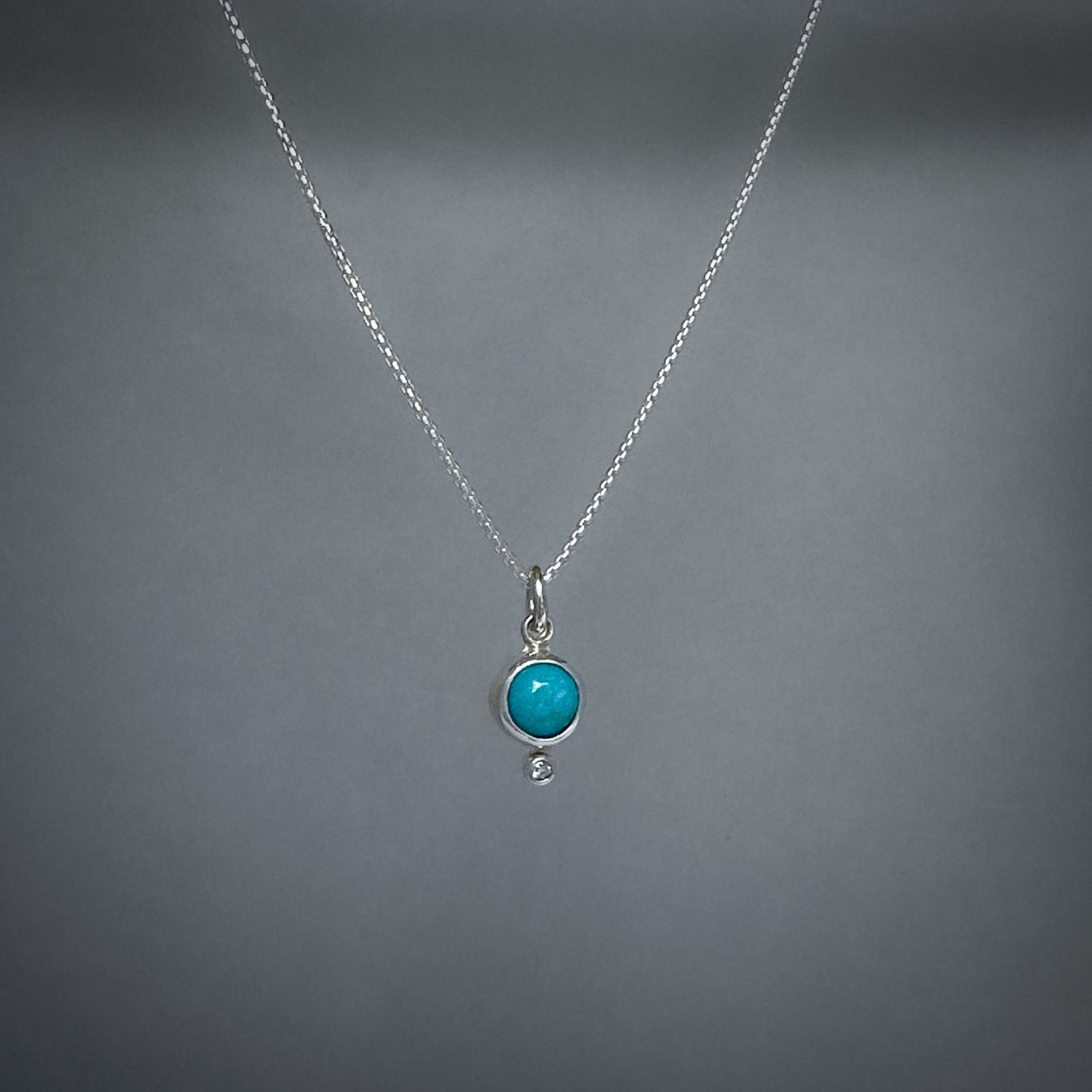 Turquoise and Topaz Pendant Necklace in Sterling Silver