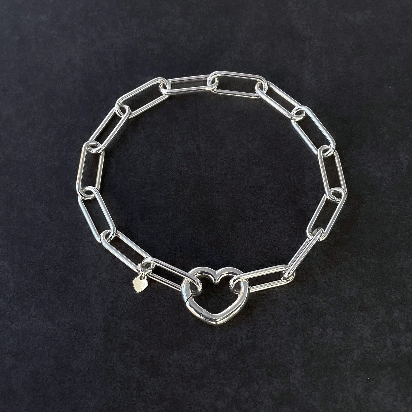 sterling silver statement bracelet with large open heart clasp