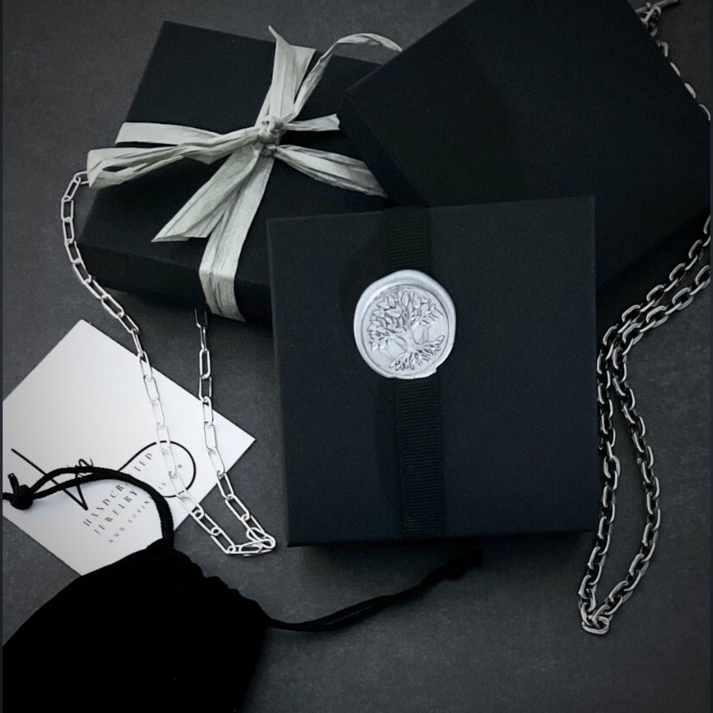 complimentary gift wrap black box wax seal stamp
