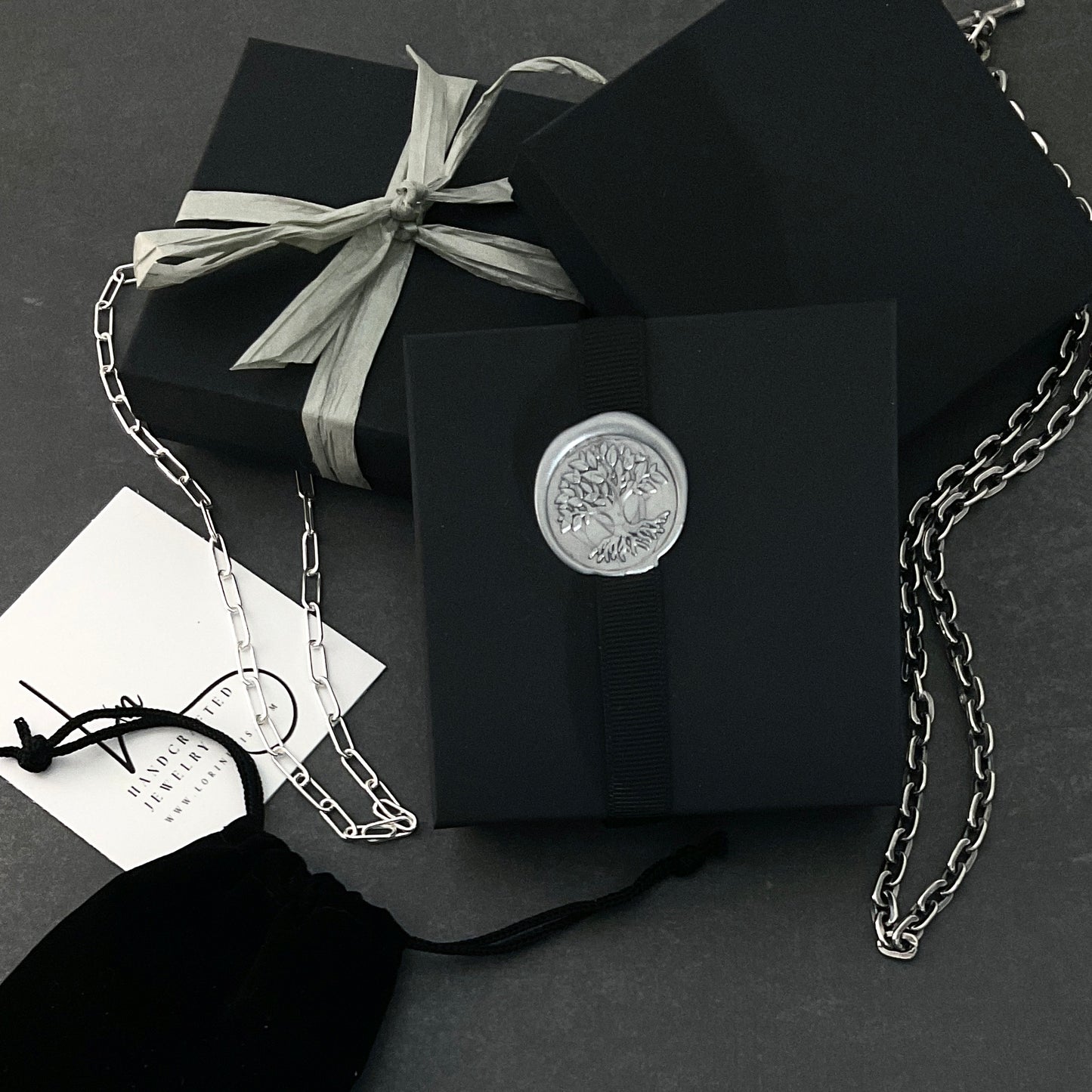 complimentary gift wrap black box wax seal stamp