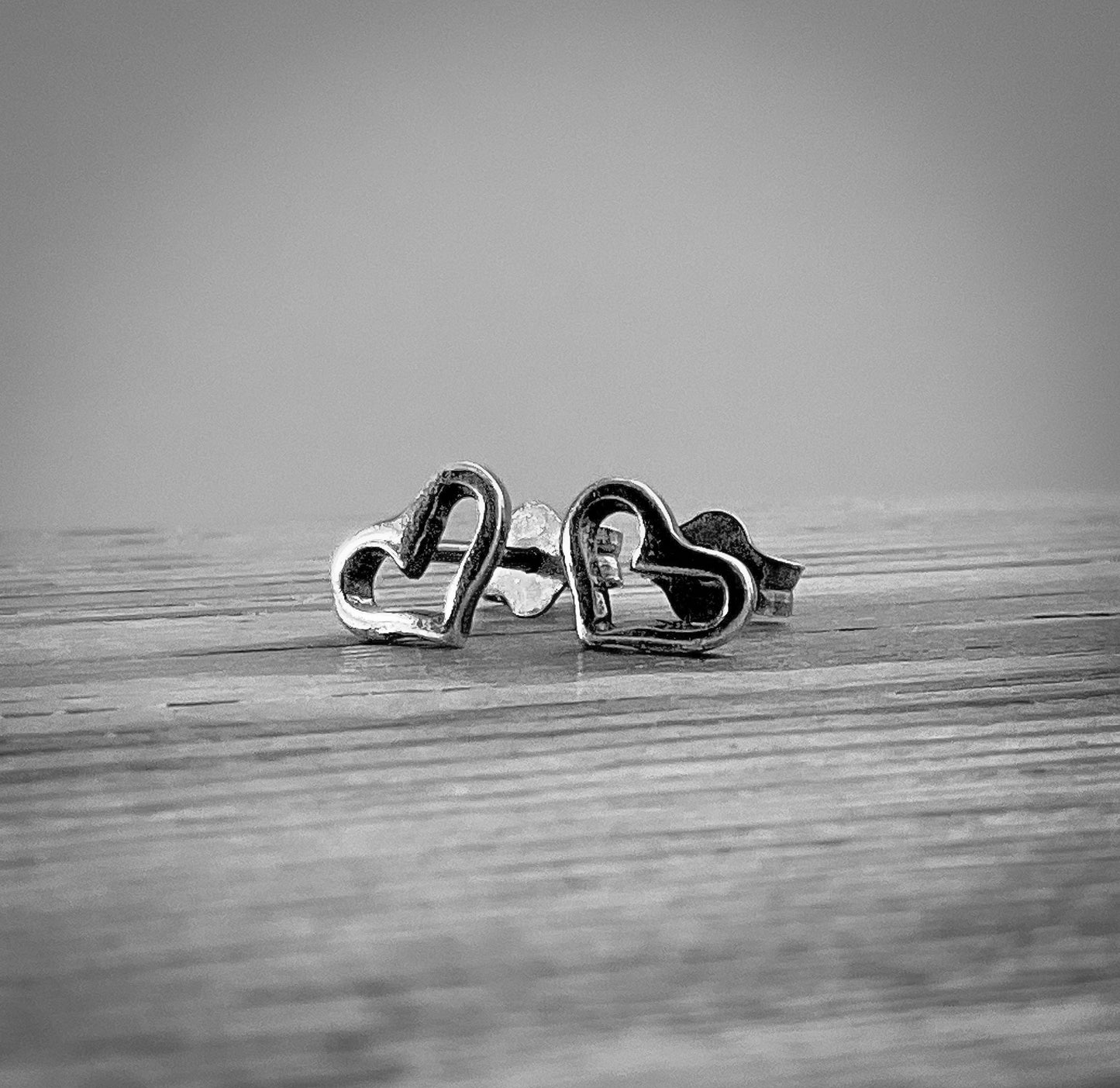 Tiny Open Heart Stud Earrings in Sterling Silver