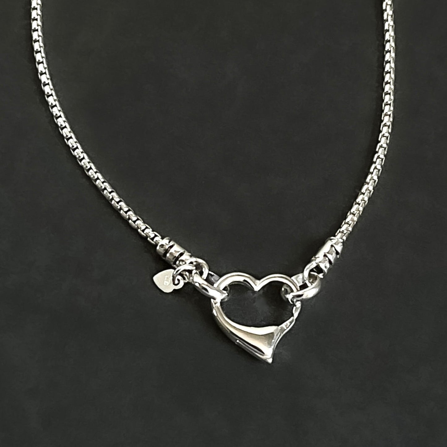 open heart clasp front closure  attached to sterling silver rounded box chain
