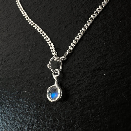 5mm rainbow moonstone pendant charm on sterling silver curb chain
