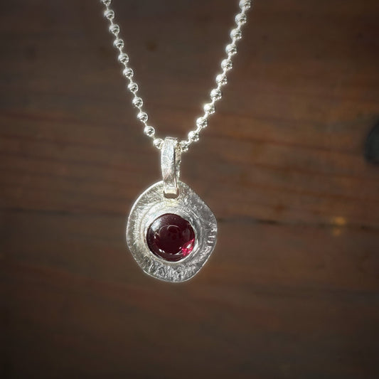 garnet pendant textured backing sterling silver necklace